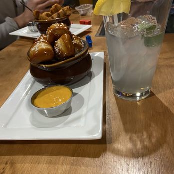 Thane’s Table - Pretzels and an elderflower drink - Tabletop Games Near Me - Arvada, Colorado