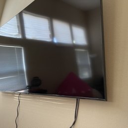 70" tilt wall mounted in my first living room 70" tilt wall mounted in my first living room