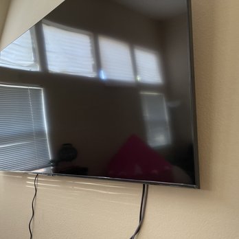 In The Sky - 70" tilt wall mounted in my first living room - Security Systems Near Me In The Sky - 70" tilt wall mounted in my first living room - Security Systems Near Me