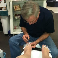 Nail Designs by Kim - The husband doing my pedi. He did a great job!