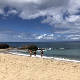 Left part is the small cave, the right is a bigger rock people can jump off of, and in the middle are little tide pools Left part is the small cave, the right is a bigger rock people can jump off of, and in the middle are little tide pools