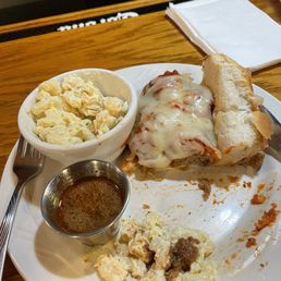 Meatball sub Mac salad and hot sauce