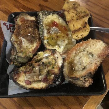 Uncle T's Oyster Bar - One of each type of charbroiled oysters - Bars Near Me - Scott, Louisiana Uncle T's Oyster Bar - One of each type of charbroiled oysters - Bars Near Me - Scott, Louisiana
