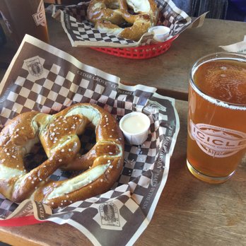 Icicle Brewing - Pretzels and Bootjack IPA, cheese sauce comes with pretzel but spicy mustard available as well - Brewpubs Near Me - Leavenworth, Washington