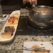 Photo of The Melting Pot - Indianapolis, IN, United States. Yum!  We were all over the place with the desserts - Banana Foster Cookies 'n Cream Marshmallow Dream Caramel Toffee Crunch