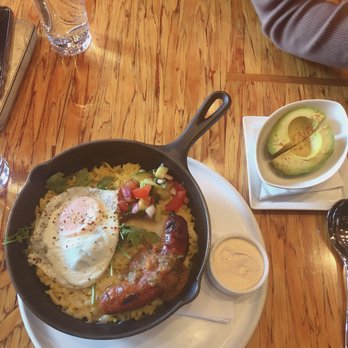 Chambar - Paella with over easy egg & side order of avocado - Belgian Near Me - Vancouver, British Columbia Chambar - Paella with over easy egg & side order of avocado - Belgian Near Me - Vancouver, British Columbia