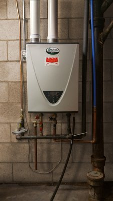 Photo of Bryant Air Conditioning, Heating, Electrical & Plumbing - Lincoln, NE, US. Tankless water heater installed by Bryant plumbing