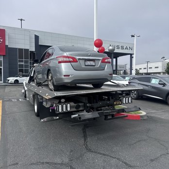 Empire Towing - car being towed - Towing Near Me Empire Towing - car being towed - Towing Near Me