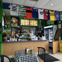 El Sabor De Mi Tierra - Interesting display of Salvadoran items at the counter.