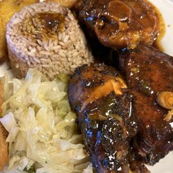 Jerk chicken oxtail combo plate