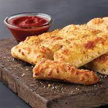 Marco's Pizza - cheesy breadsticks with ketchup - Italian Near Me - Doral, Florida Marco's Pizza - cheesy breadsticks with ketchup - Italian Near Me - Doral, Florida