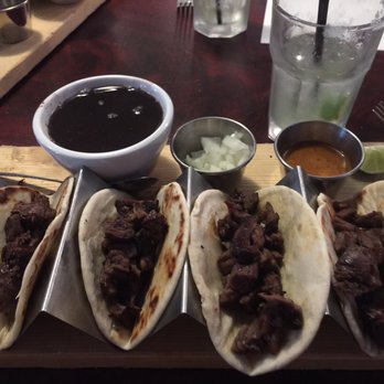 Neri's On the Square - Carne asada steak street tacos with no cilantro and onion on the side with flour tortillas! Come with a side of black beans. - New American Near Me - Graham, Texas Neri's On the Square - Carne asada steak street tacos with no cilantro and onion on the side with flour tortillas! Come with a side of black beans. - New American Near Me - Graham, Texas