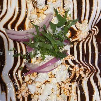 Blue Corn - a plate of food on a table - Cocktail Bars Near Me - Philadelphia, Pennsylvania
