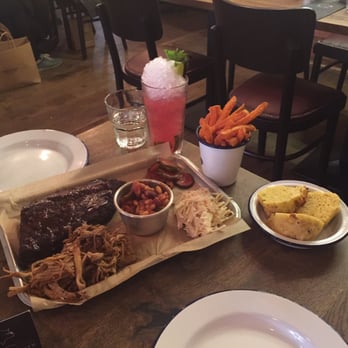 Porky's BBQ Bankside - Half baby back ribs & half pulled pork platter with cheesy jalapeño corn bread & sweet potato fries - Barbeque Near Me - London, XGL