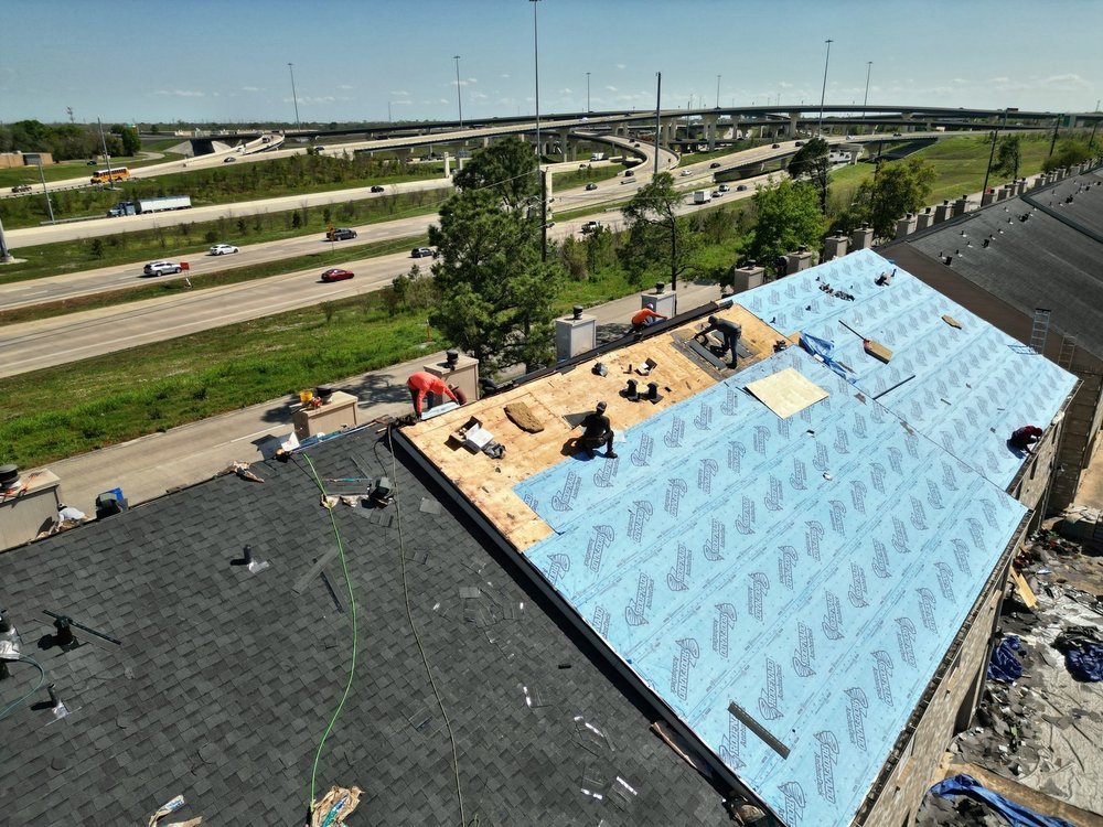 Slide of Whatley Roofing