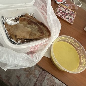 Rose’s Kitchen - Roti and yellow curry - Thai Near Me - Austin, Texas