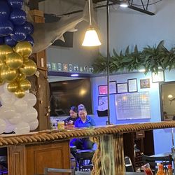 Coco Bongo Mariscos & Mexican Restaurant - Busy staff on their phones.