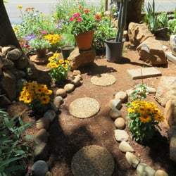 Kendall Home and Yard Florist & Nursery - We used rocks and stepping stones at the customers property to create access to the garden.