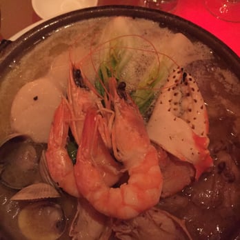 Morimoto - Seafood "toban yaki" with buttery dashi and assorted shellfish. Hard to eat without covering yourself in fish butter but very rich and good! - Japanese Near Me - Philadelphia, Pennsylvania