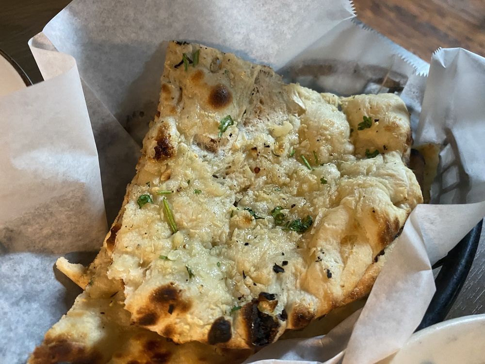 Leo’s Grill Indian Cuisine Logo