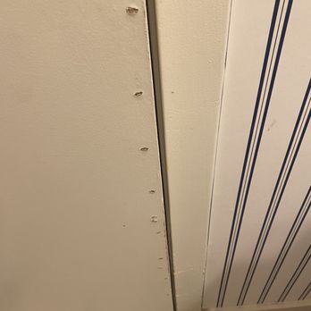 SAN Airport parking at Sheraton San Diego Hotel and Marina - Looks like guest had to scratch and claw their way out of the bathroom. Or, maybe the painter hasn't visited since J Carter was president? - Hotels Near Me - San Diego, California