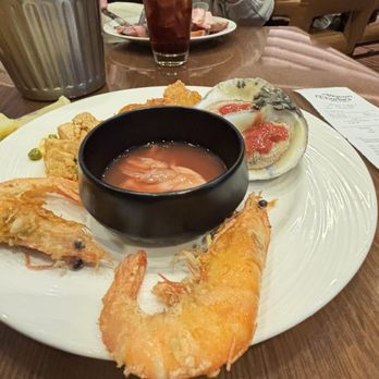 Toucan Charlie's Buffet & Grille - Salt and pepper big prawns, oysters shooters - Buffets Near Me - Reno, Nevada Toucan Charlie's Buffet & Grille - Salt and pepper big prawns, oysters shooters - Buffets Near Me - Reno, Nevada