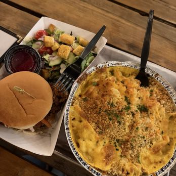 Gunsight Saloon - Buttermilk fried chicken sandwich, with house, side salad, and huckleberry vinaigrette. Righteous mac & cheese entrée. - American Near Me - Columbia Falls, Montana