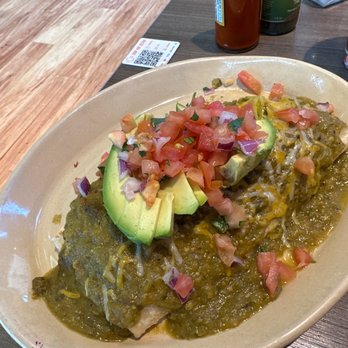 Snooze, an A.M. Eatery - The snooze burrito with green Chile sauce - Breakfast & Brunch Near Me - Lone Tree, Colorado Snooze, an A.M. Eatery - The snooze burrito with green Chile sauce - Breakfast & Brunch Near Me - Lone Tree, Colorado