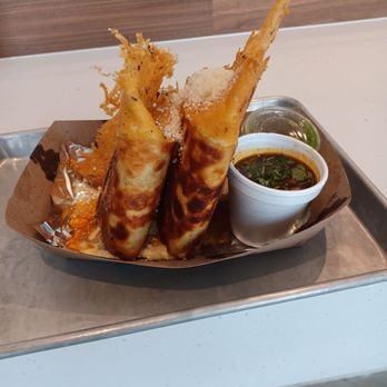 Great Southern Box - Beef Birria Quesadilla w/ salsa verde, consomme, and yummy sauce - Venues & Event Spaces Near Me - Orlando, Florida Great Southern Box - Beef Birria Quesadilla w/ salsa verde, consomme, and yummy sauce - Venues & Event Spaces Near Me - Orlando, Florida