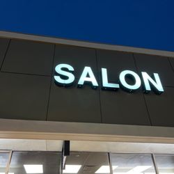 Heaven & Earth Beauty Salon - Outside signage at the salon in the evening