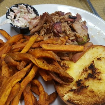 Romie's Grocery - Pulled pork sandwich and sweet potato fries. Pork was Awesome! - American Near Me - Tupelo, Mississippi