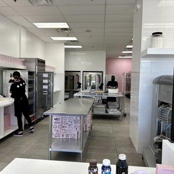 Crumbl - Reston - The staff getting cookies ready. - Bakeries Near Me - Reston, Virginia