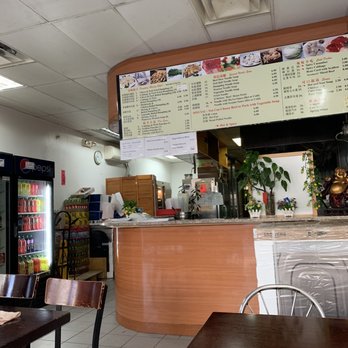 Tasty Dumpling - Seating area with posted menu - Chinese Near Me - New York, New York Tasty Dumpling - Seating area with posted menu - Chinese Near Me - New York, New York