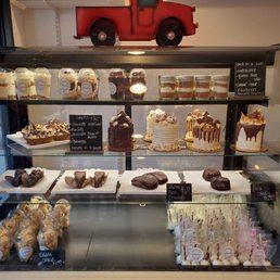 a display of cakes and pastries