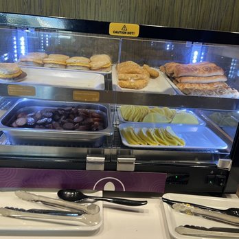 Home2 Suites by Hilton Bloomington Normal - Hot breakfast selection plus make your own waffles - Hotels Near Me - Normal, Illinois