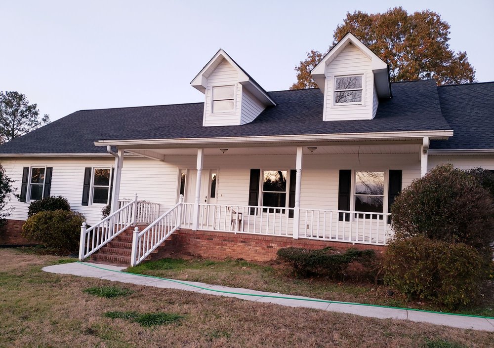 Slide of Herbert Shiflett Roofing
