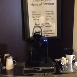 8 Village Square a Tamra Berry Salon - Free coffee or tea and the list of services.