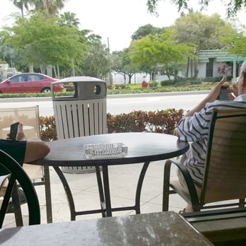 Cafe Sportivo - Has a few outside sidewalk tables and chairs - Cafes Near Me - Pompano Beach, Florida Cafe Sportivo - Has a few outside sidewalk tables and chairs - Cafes Near Me - Pompano Beach, Florida