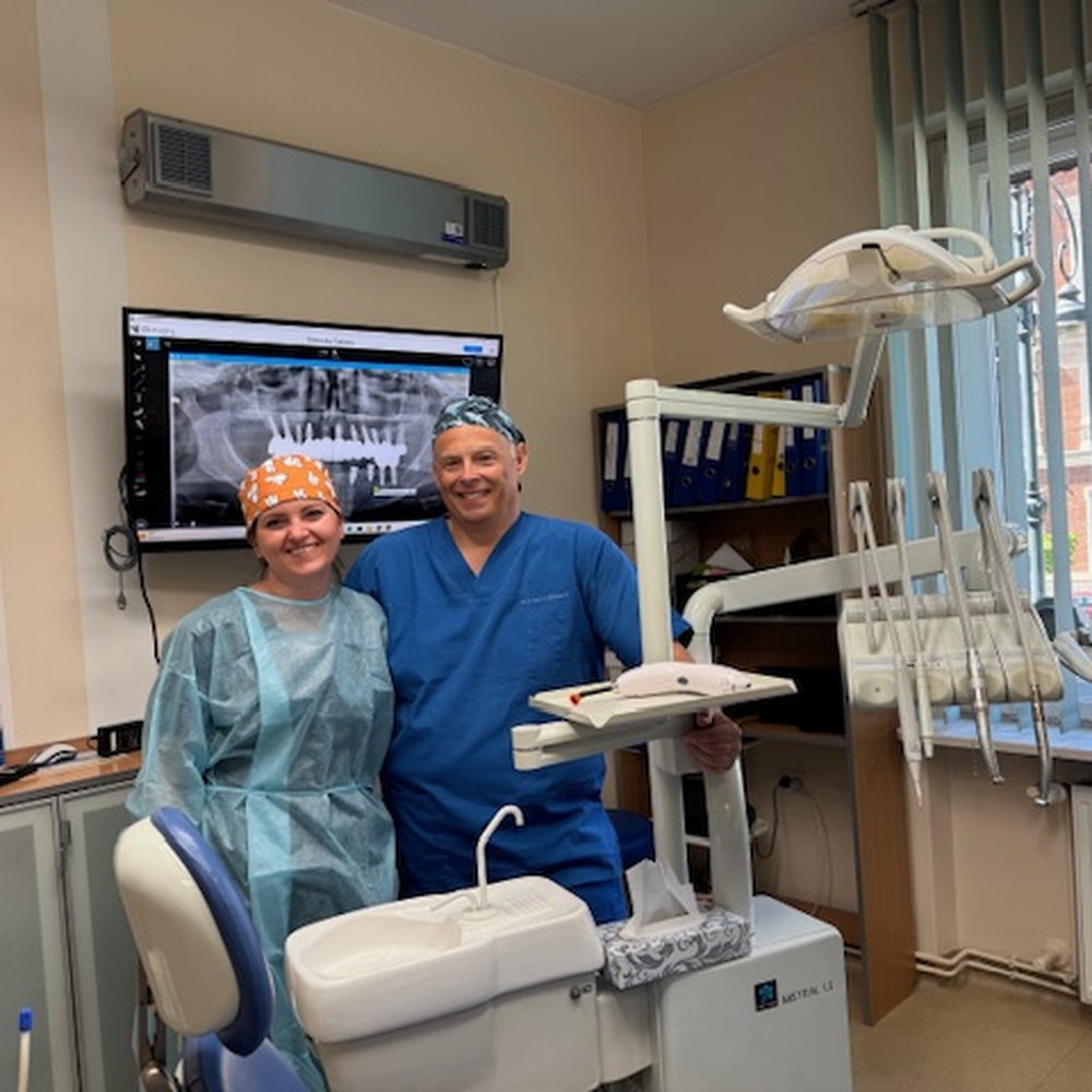 Armadent - Doctor Arkadiusz Makowiecki and his lovely assistant - General Dentistry Near Me - Kraków, Massachusetts