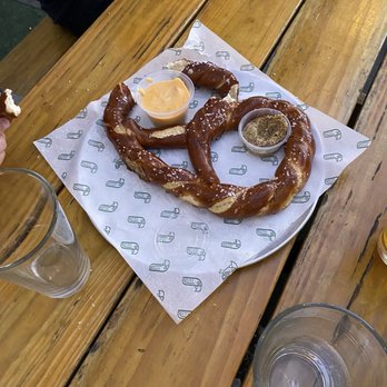 Green Cheek Beer Co. - German Pretzel with mustard and cheese dip - Breweries Near Me - Costa Mesa, California Green Cheek Beer Co. - German Pretzel with mustard and cheese dip - Breweries Near Me - Costa Mesa, California