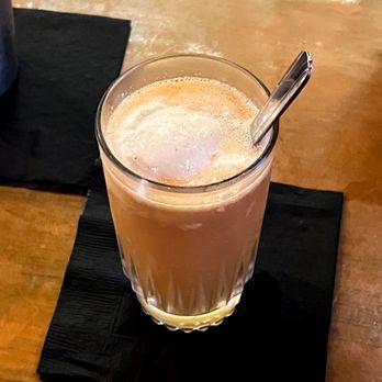 Paper Plane - Summer 93' has Gin, Madeira, Cantaloupe, Lemon, Saline, Soda, Vanilla Ice Cream. - Cocktail Bars Near Me - San Jose, California