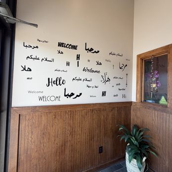 Sahara Mediterranean Food - Really nice mural of hello and welcome in many languages as you enter. I love this! - Mediterranean Near Me - Lees Summit, Missouri Sahara Mediterranean Food - Really nice mural of hello and welcome in many languages as you enter. I love this! - Mediterranean Near Me - Lees Summit, Missouri