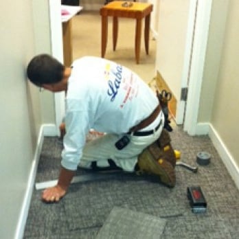 World Class Floors - a man working on the floor - Flooring Near Me - Saint Louis, Missouri World Class Floors - a man working on the floor - Flooring Near Me - Saint Louis, Missouri