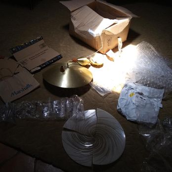 The UPS Store - Total Contents of box. Glass bottom of lamp was resting on that single flat piece of thin cardboard and that small flat paper bag. - Shipping Centers Near Me - Nashua, New Hampshire