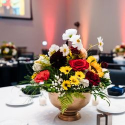 Sow Wonder Florals - Compote Centerpiece in Maryland colors to celebrate a local companies 70th anniversary.