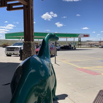 Coffee Cup Fuel Stop - a green dinosaur statue - Gas Stations Near Me - Moorcroft, Wyoming Coffee Cup Fuel Stop - a green dinosaur statue - Gas Stations Near Me - Moorcroft, Wyoming