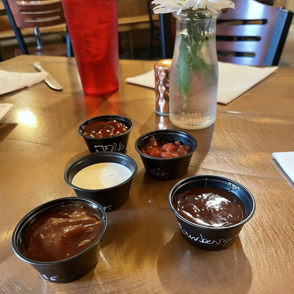 Curious Pig - 5 complimentary sauces served - Smokehouse Near Me - Crystal Falls, Michigan