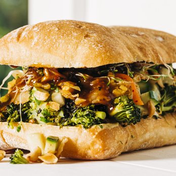 The Half - a sandwich with broccoli and sauce - Sandwiches Near Me - Wilmington, North Carolina