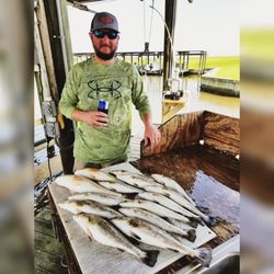 Tidal Charters - Calcasieu Lake is known for speckled trout, spend your morning setting the hook on these spotted fish and plan your fish fry!