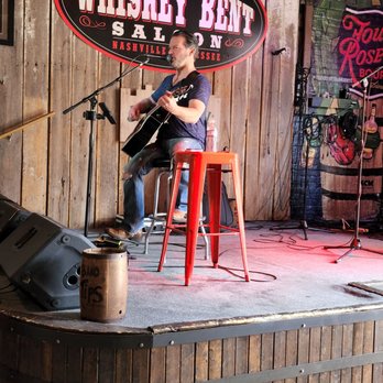 Whiskey Bent Saloon - a man playing guitar on stage - Music Venues Near Me - Nashville, Tennessee Whiskey Bent Saloon - a man playing guitar on stage - Music Venues Near Me - Nashville, Tennessee